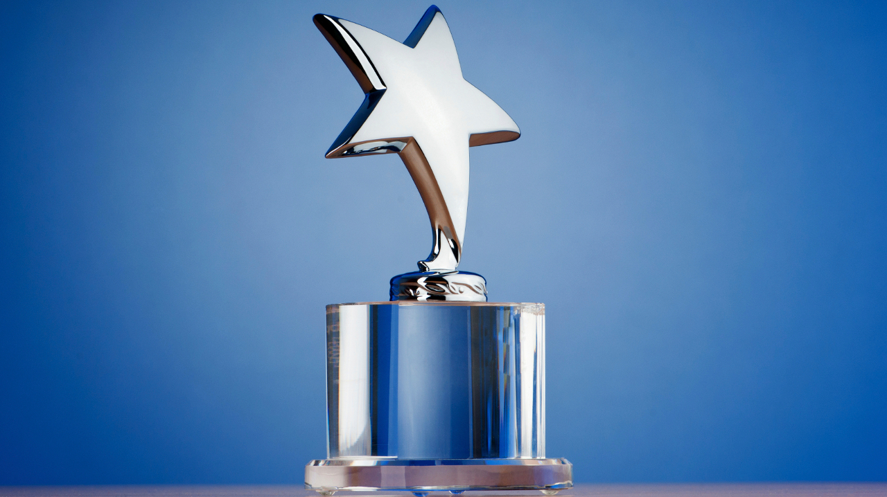 Star award against gradient background